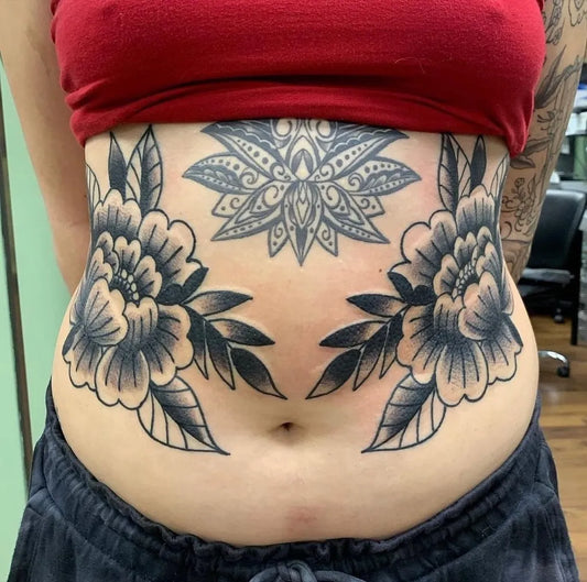 Big Blackwork Mandala Peonies Tattoo on Women Stomach by @lostharbortattoo