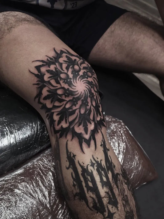 Big Blackwork Mandala and Gothic Text Tattoo on Men Knee by @jlopeztattoos