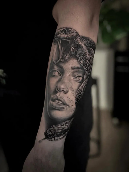 Big Blackwork Medusa Snake Face on Men Arm Tattoo by @abbyloutattoo