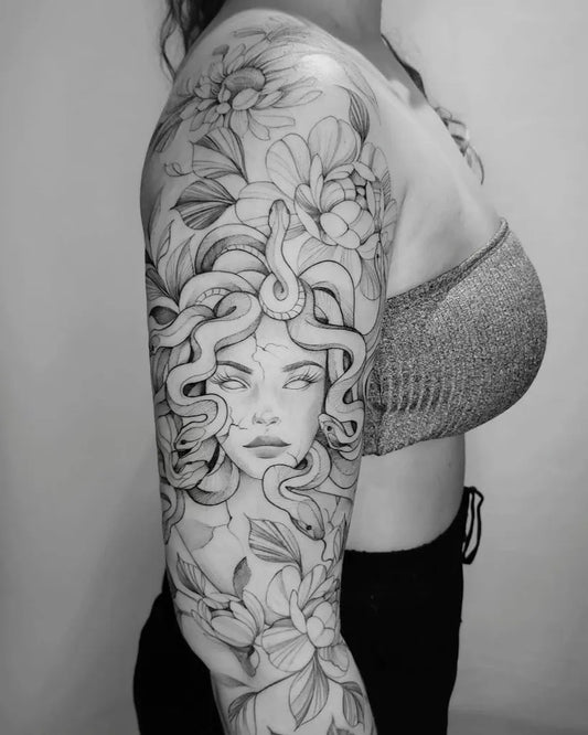 Big Blackwork Medusa Snakes Flowers on Women Arm Tattoo by @karoldiastattooist