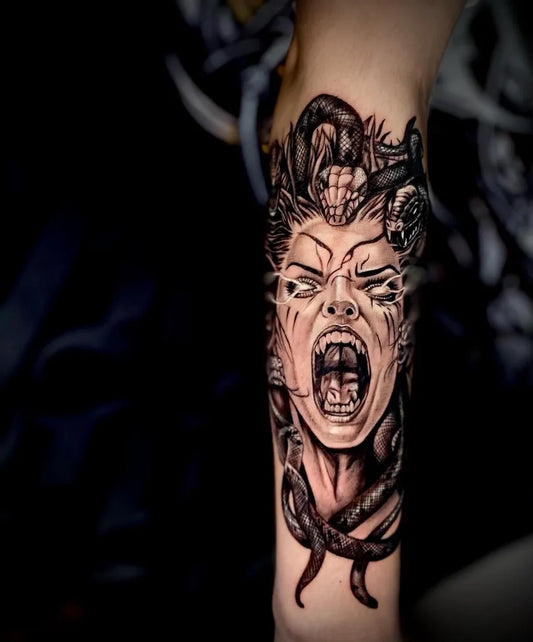 Big Blackwork Medusa Snakes on Women Arm Tattoo by @bakitattoooink