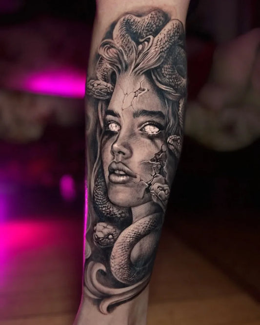 Big Blackwork Medusa Snakes on Women Arm Tattoo by @claudiarealistictattoo