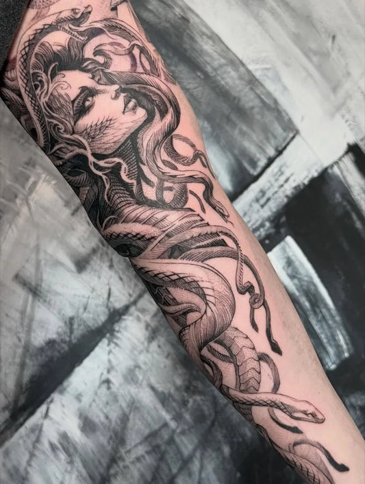 Big Blackwork Medusa Snakes on Women Arm Tattoo by @martinkellytattoo