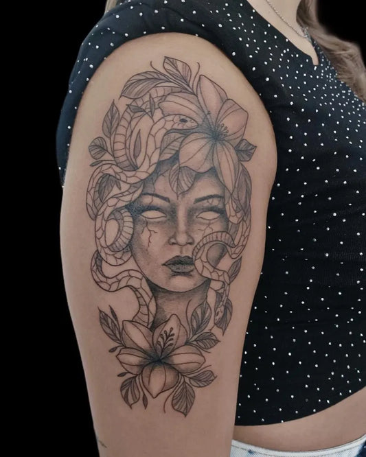 Big Blackwork Medusa with Snakes and Lilies on Women Arm Tattoo by @zerbi_tattoo