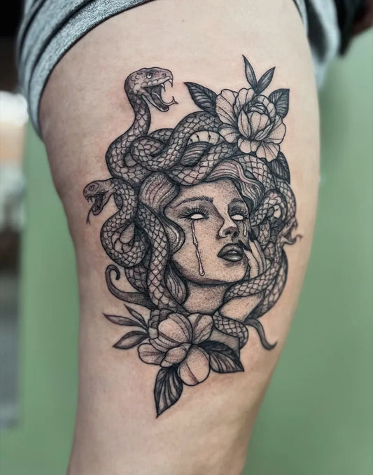 Big Blackwork Medusa with Snakes and Roses on Women Thigh Tattoo by @sarahoftheshire.tattoos
