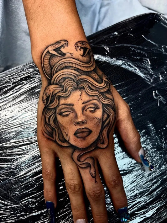 Big Blackwork Medusa with Snakes on Women Hand Tattoo by @tatsbyrisha