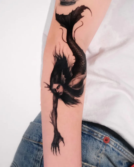 Big Blackwork Mermaid Tattoo on Women Arm by @tobi.tatts