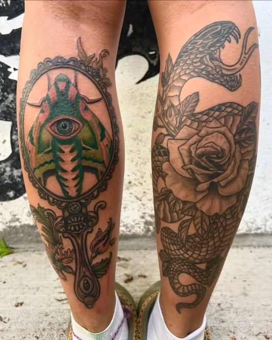 Big Blackwork Mirror Beetle Snake Tattoo on Women Calf by @8ofswordstattoo