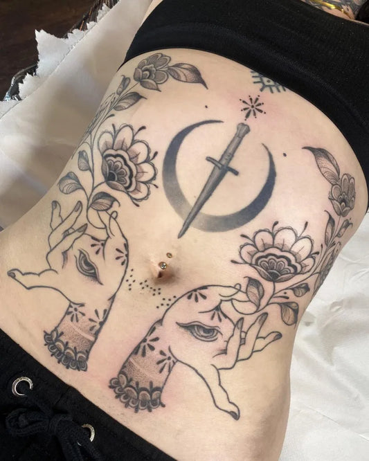 Big Blackwork Moon Dagger Hands Tattoo on Women Stomach by @emi1yelizabeth
