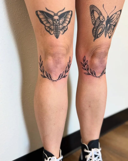 Big Blackwork Moth Laurel Tattoo on Women Knee by @carmen_tattoos182