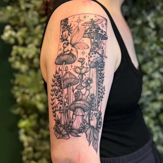 Big Blackwork Mushroom Fairy Snail on Women Arm Tattoo by @lone_bee_tattoo