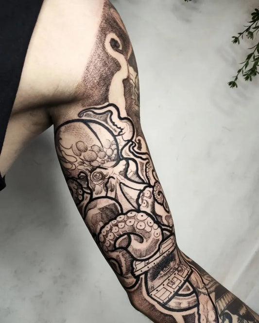 Big Blackwork Octopus Tattoo on Men Arm by @marcosvincitattoo