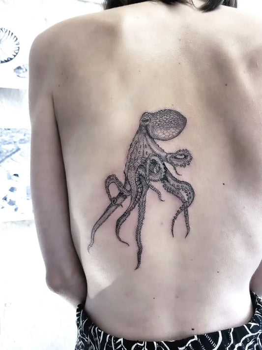 Big Blackwork Octopus Tattoo on Women Back by @emiliebiens_scientificart