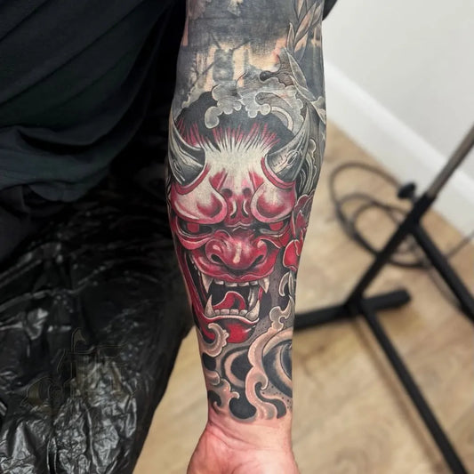 Big Blackwork Oni Mask with Clouds on Men Arm Tattoo by @juniortattoostudiogalway