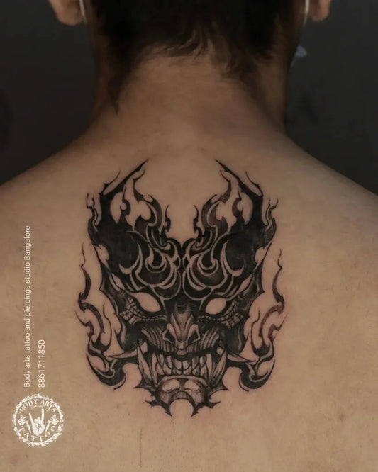 Big Blackwork Oni Mask with Flames on Men Back Tattoo by @bodyarts_blr