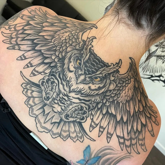 Big Blackwork Owl with Wings on Women Back Tattoo by @whereeaglesdaretattoo