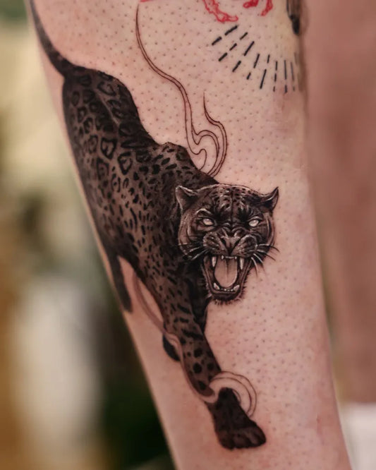 Big Blackwork Panther Tattoo on Men Leg by @vivi_tattooer