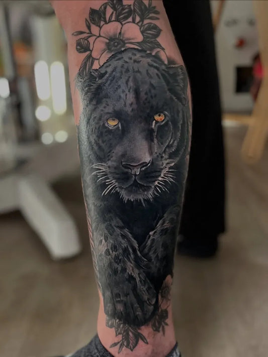 Big Blackwork Panther and Flowers Tattoo on Men Leg by @modernmarkings