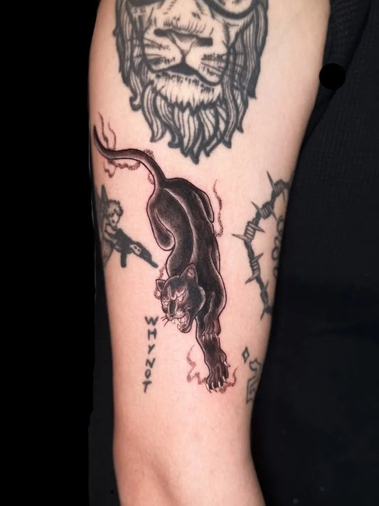 Big Blackwork Panther and Lion Tattoo on Men Arm by @stabbykimchii