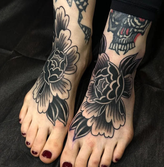 Big Blackwork Peony Skull and Flowers on Women Feet Tattoo by @hamtown.tattoo