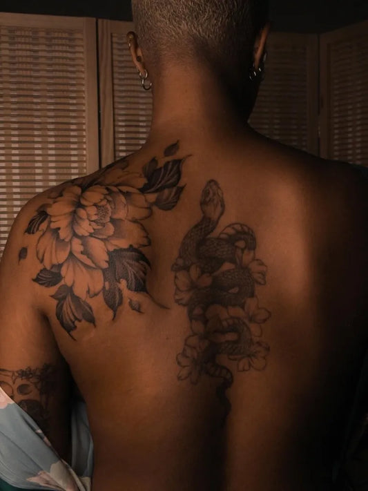 Big Blackwork Peony and Snake on Men Back Tattoo by @lucid.invitation