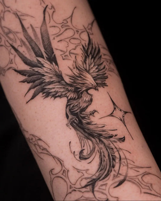 Big Blackwork Phoenix with Flames on Women Arm Tattoo by @maggie_tattoo_page