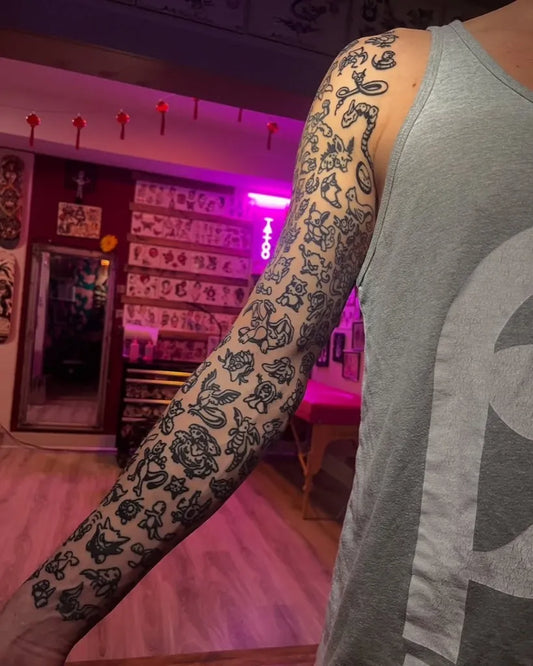 Big Blackwork Pokemon Tattoo on Men Arm by @gamer.ink