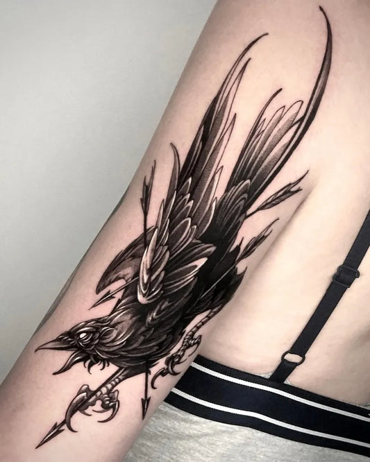 Big Blackwork Raven on Women Arm Tattoo by @on.doo_tt