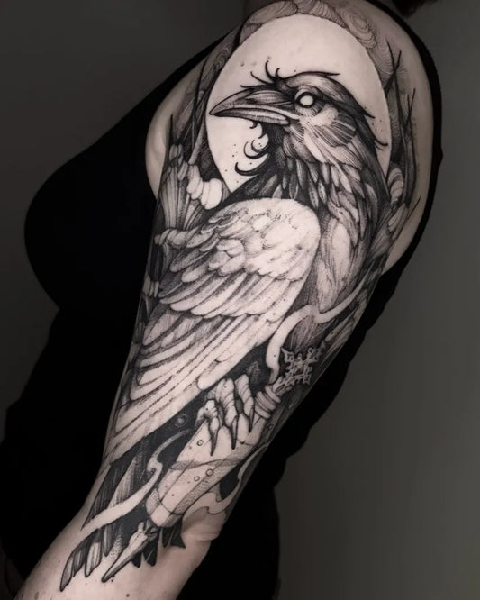 Big Blackwork Raven with Moon and Branches on Women Shoulder Tattoo by @no.ai.di_tattoo