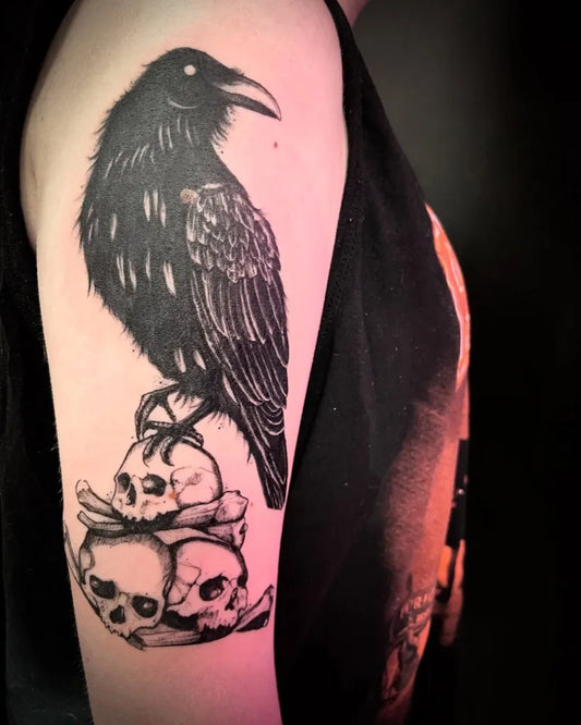Big Blackwork Raven with Skulls on Women Arm Tattoo by @magdalennamarc
