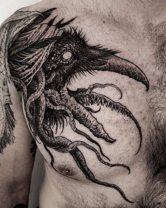 Big Blackwork Raven with Tentacles on Men Chest Tattoo by @konradkrajdaart