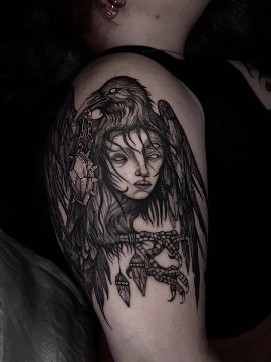 Big Blackwork Raven with Woman Face on Women Arm Tattoo by @mirthwurm