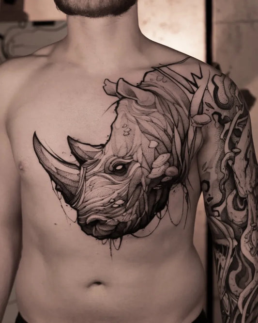 Big Blackwork Rhino on Men Chest Tattoo by @tattoosfolder
