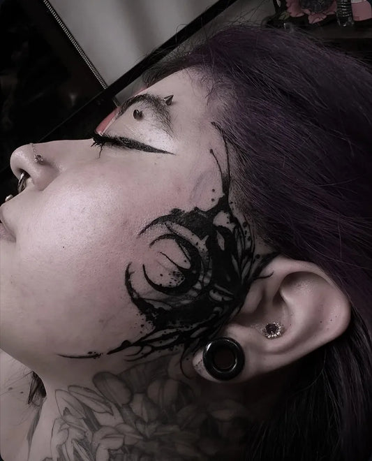 Big Blackwork Rose and Crescent on Women Face Tattoo by @jlopeztattoos