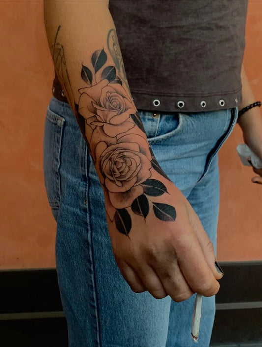 Big Blackwork Roses on Women Arm Tattoo by @federicoruggiero