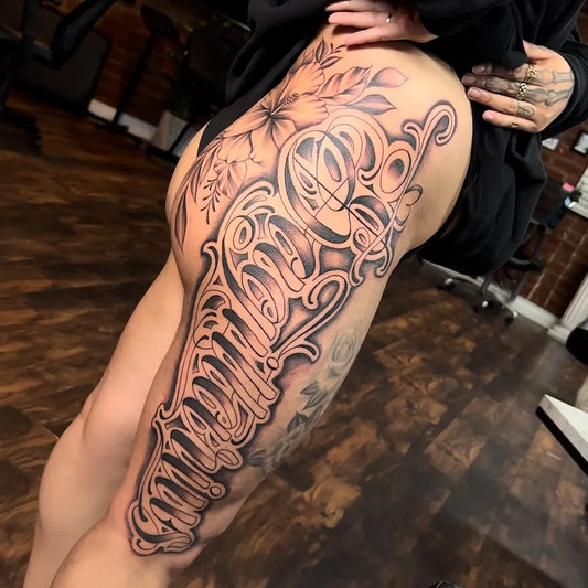 Big Blackwork Sagittarius Script Tattoo on Women Thigh by @tattoo_la_leslie