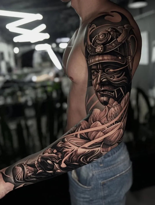 Big Blackwork Samurai Hannya Mask and Lotus Flower Tattoo on Men Arm Full Sleeve by @david_marulanda_