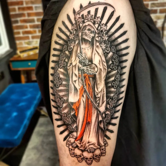 Big Blackwork Santa Muerte with Scythe and Flowers Tattoo on Men Arm by @buddytattoos