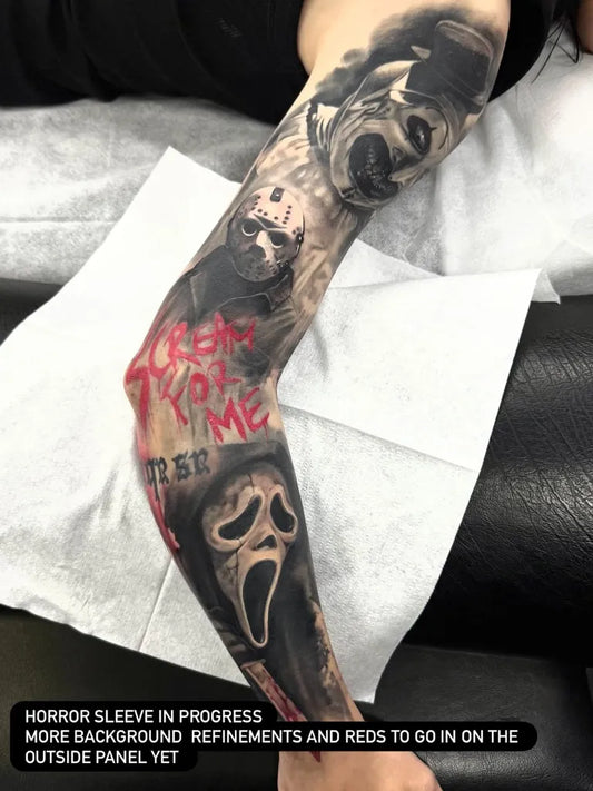 Big Blackwork Scream Face Horror Tattoo on Men Arm by @drawingbloodstudio