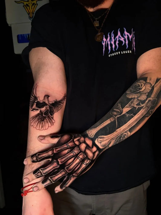 Big Blackwork Skeleton Hand and Eagle Tattoo on Men Arm by @b0mbayink