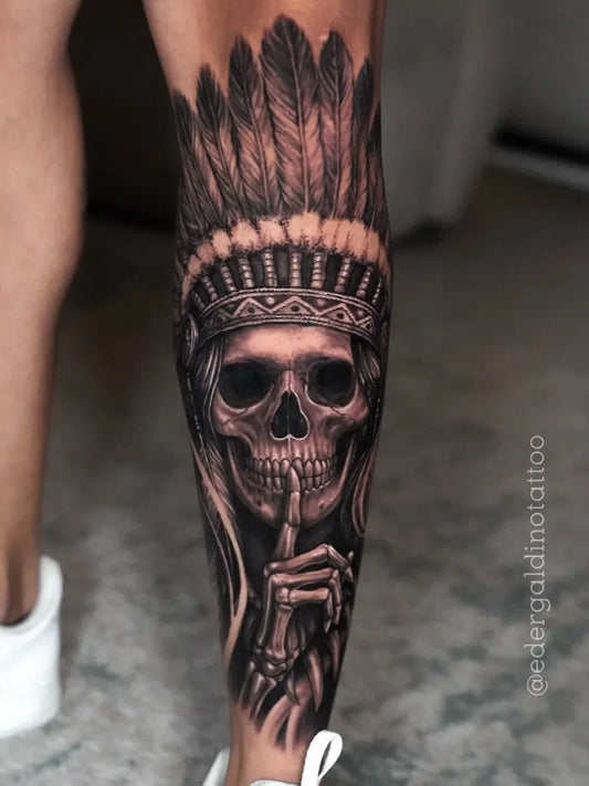 Big Blackwork Skull Feather Headdress on Men Leg Tattoo by @edergaldinotattoo