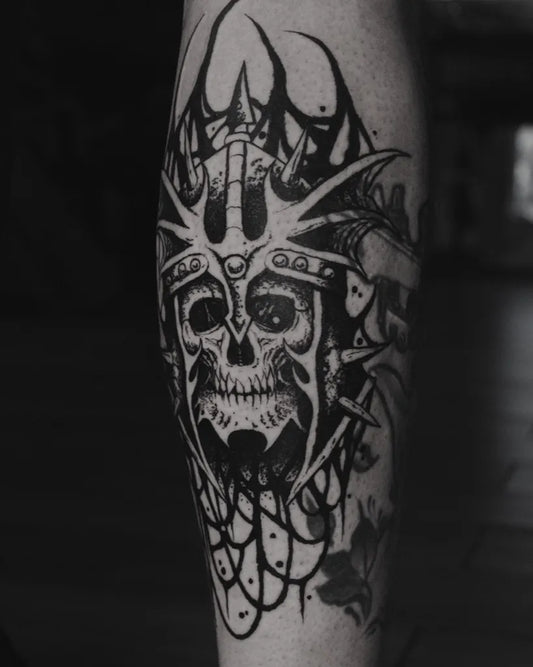 Big Blackwork Skull Horned Helmet on Men Leg Tattoo by @armonia.ttt
