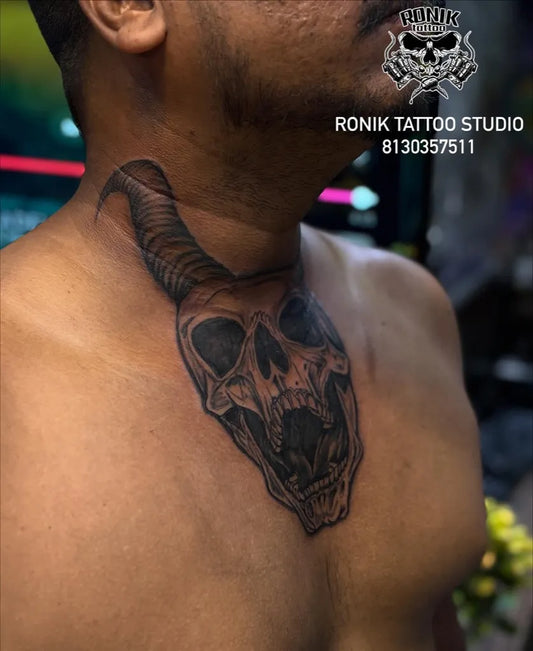 Big Blackwork Skull Horns on Men Chest Tattoo by @ronik_tattoo_studio