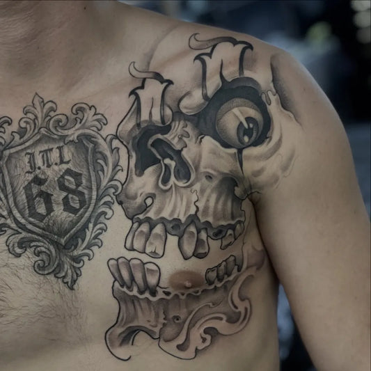 Big Blackwork Skull Shield on Men Chest Tattoo by @jgilestattoo