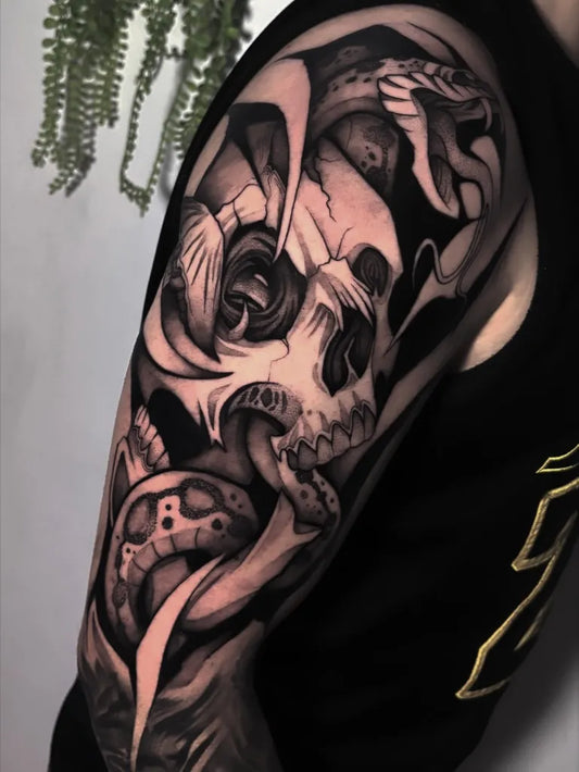 Big Blackwork Skull Snakes Roses on Men Arm Tattoo by @juancorrea_art