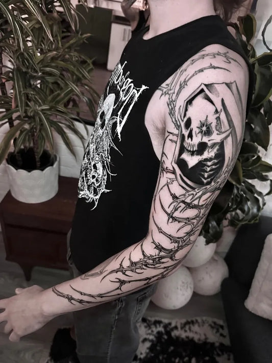 Big Blackwork Skull and Barbedwire on Men Arm Sleeve Tattoo by @frattalica