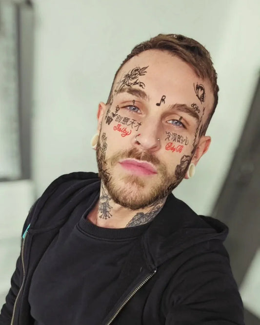 Big Blackwork Skull and Words on Men Face Tattoo by @jimbogambles
