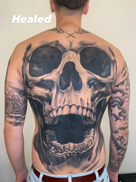 Big Blackwork Skull on Men Back Tattoo by @konrad_zurowski