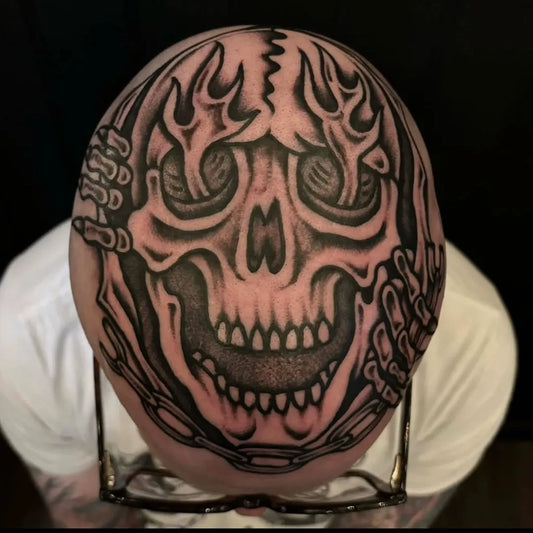 Big Blackwork Skull with Flames and Chains Tattoo on Men Head by @traditionaltat