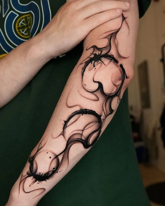 Big Blackwork Smoke Rings on Men Arm Tattoo by @tattooist_mate